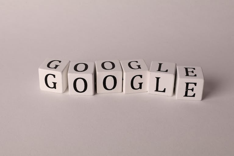 Scrabble tiles spelling 'SEO' on a wooden surface. Ideal for digital marketing themes.